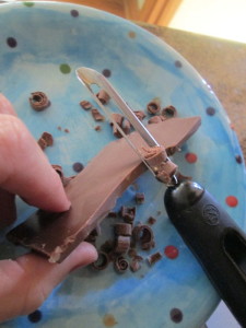 HELPFUL HINT: use a vegetable peeler to make small chocolate curls, or you can use a micro plane to make chocolate dust.