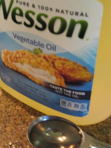 Two tablespoons oil, use vege or canola.