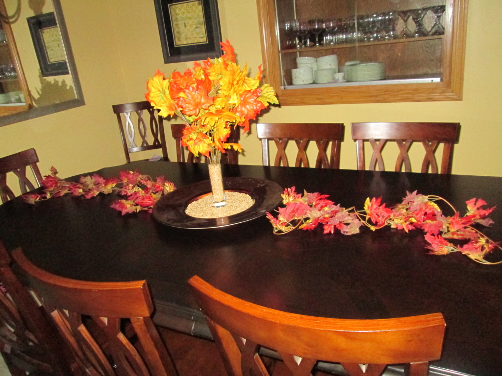 Ta-Duh!!  There you have a simple, but lovely table décor for this beautiful fall season! Total cost : Under $6.00!  HELPFUL HINT: I reuse the same stuff every year, including the wheat.  Just put it in a zip bag and store in your holiday décor.  Happy Fall!
