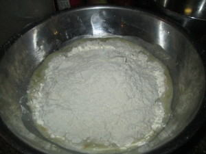 Add 4 cups of flour.