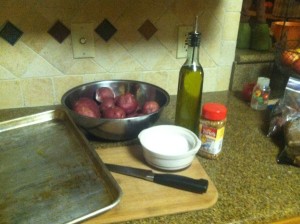 Get all your ingredients together, salt, rosemary seasonings, red potatoes and olive oil.