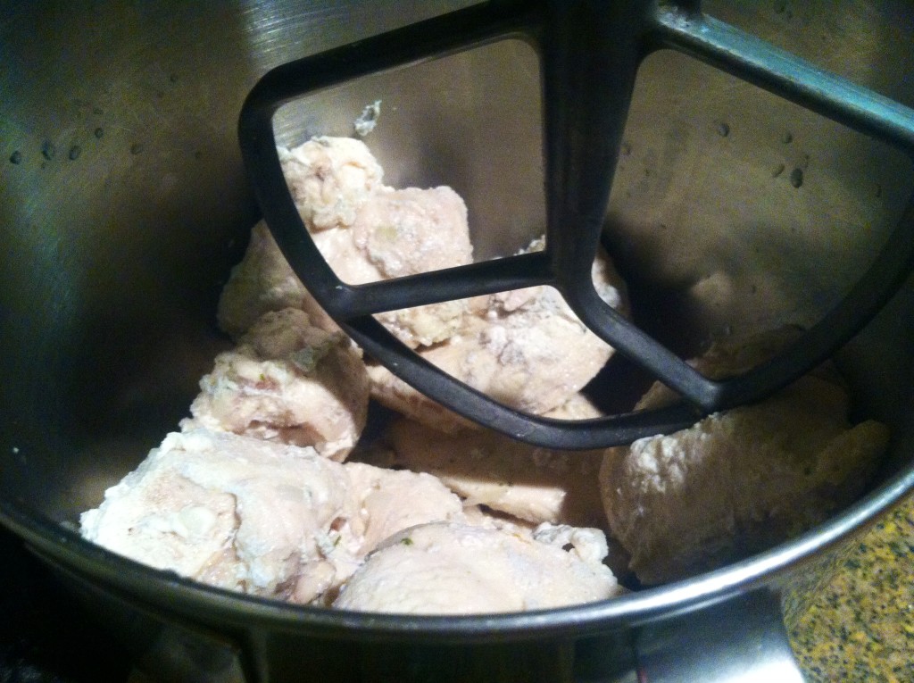 Take your chicken, in this case it was boiled.  I didn't even let it cool !  Just throw it in your kitchen aid!