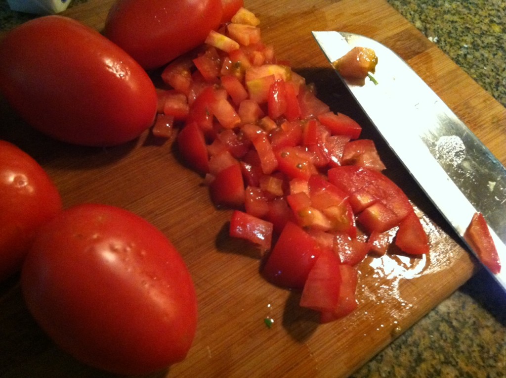 Chop 4 tomatos, my favorite is the roma !