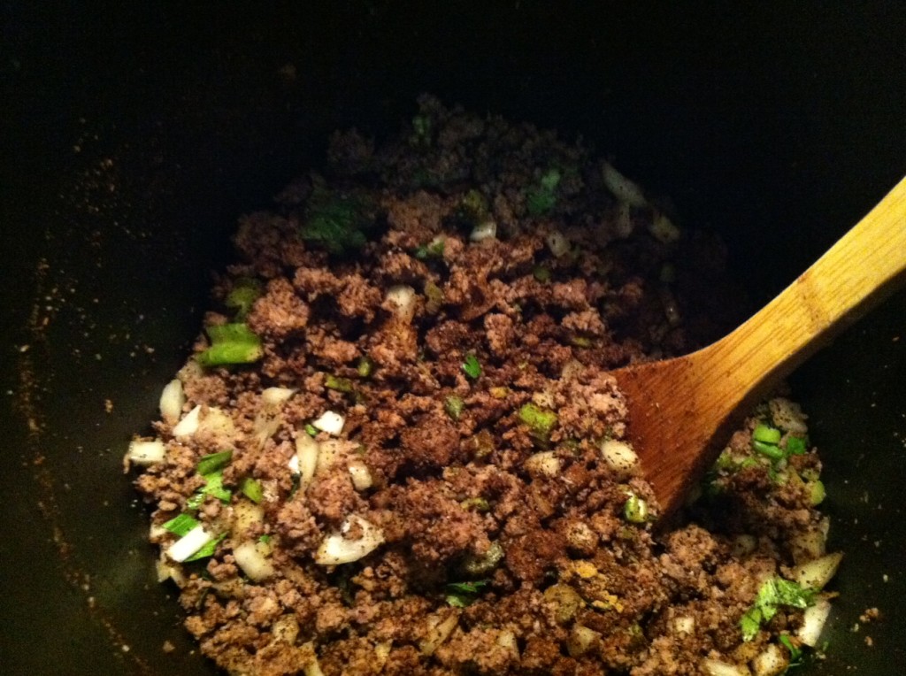 Mix seasoning into beef mixture. It smells really good!