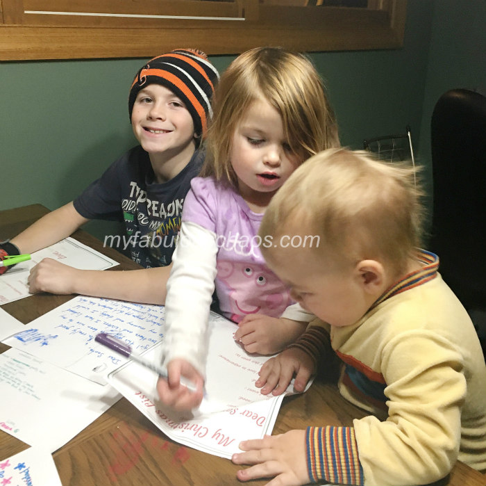 family writing letters to santa