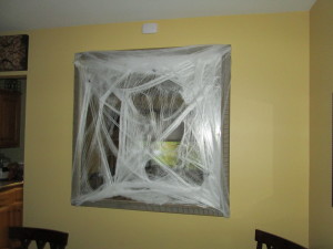 I love the spider webs! You can turn anything spooky!  This is a large mirror, there are a few spiders mixed in the web!