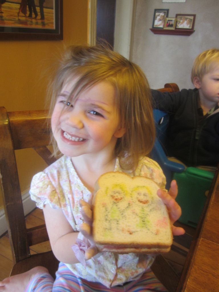 Lucy decorating her sandwich! 2011