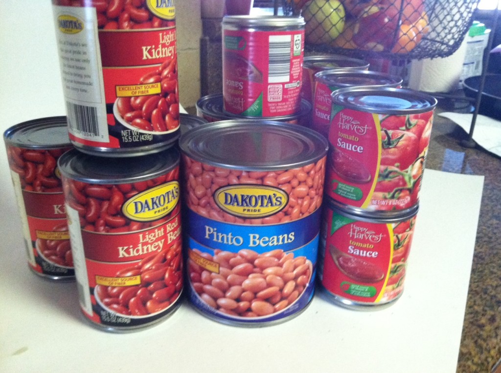  You will need kidney beans, pinto beans and tomato sauce.  30 oz of each, or right around there.  Basicallly, one big can, or two med cans or 4 of the little cans.